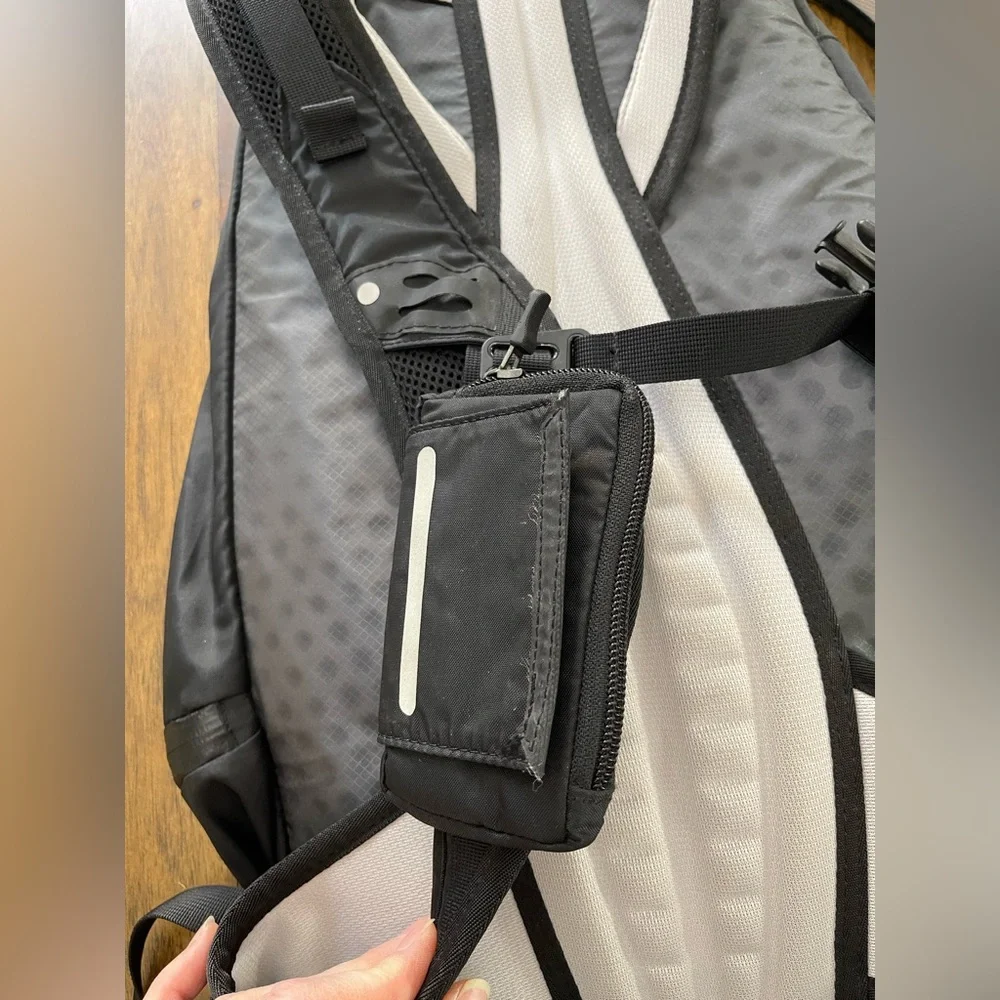 Nike running backpack rain cover and shoe compartment